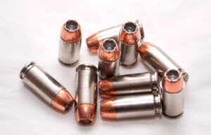40 Caliber Hollow Point Bullets On A White Background