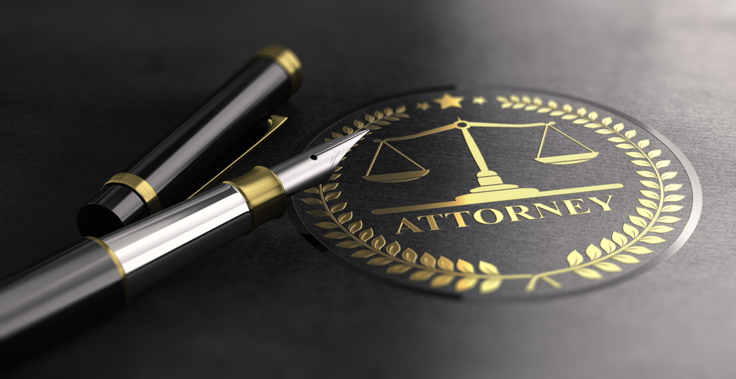 A seal bearing the scales of justice and the word attorney with a fountain pen next to it.