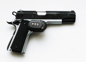 An automatic pistol making use of a trigger lock with a numerical combination.