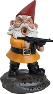 The typical garden gnome with an angry expression and holding a rifle