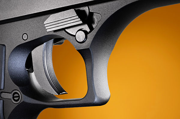 Closeup on the trigger of a pistol.