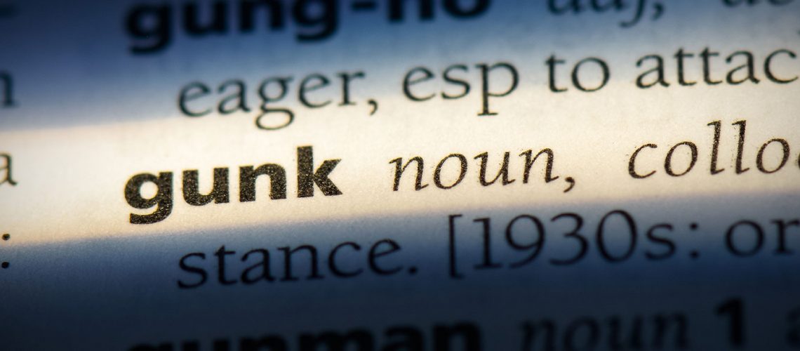 Dictionary listing for the word "gunk" which describes the messy nature of cosmoline